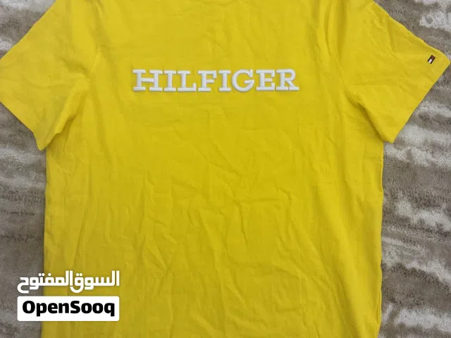 TOMMY HILFIGER  yellow t shirt never used
