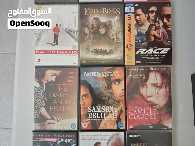 12 assorted DVDs ( some new )