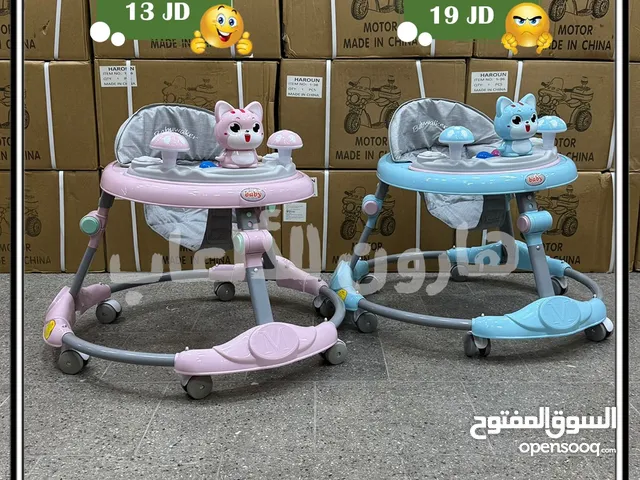 عربة تعليم مشي ونطاطه و يد للدفع وموسيقى نخب اوربي