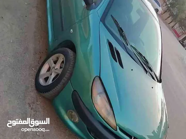 بيجو 206 Peugeot 206 /اوتوماتيك  ترخيص سنه كامله مرفق ورقه فحص سعر 2000 دينار