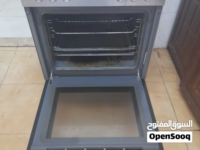 غاز كهربا مع فرن لون سلفر وموفر للكهربا
