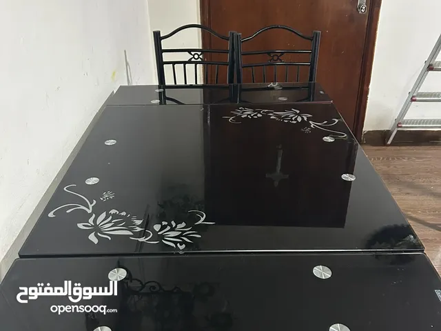 Dining table can be extended both side.