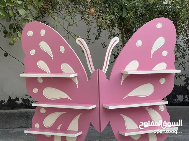 أقولس وستاندات على شكل فراشة