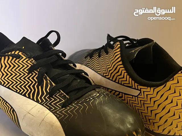 Unisex Puma kids football shoes (yellow) - حذاء اطفال لون اصفر لكرة القدم (صالح للجنسين)