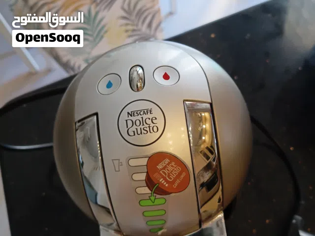 ماكنة القهوة الاصلية من نسكافية دولتشي غوستو للبيع الماكنة ينقصها قاعدة الابرة الموجودة في الصورة