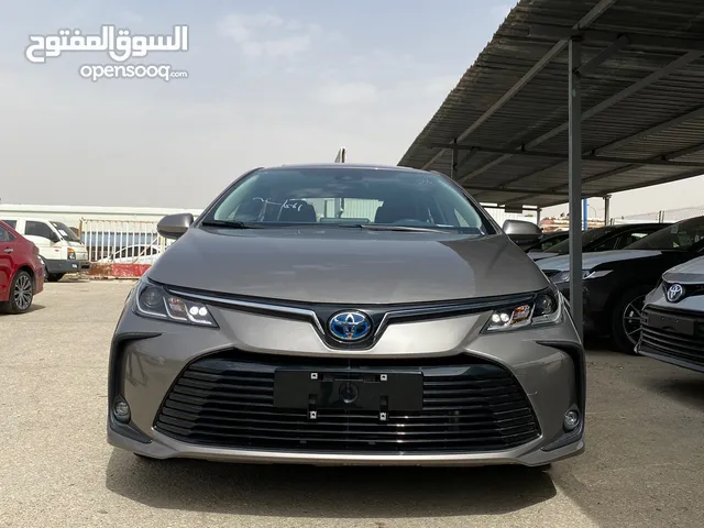 كورولا 2022 فل فتحه هايبرد 1.8 •اقل سعر بالسوق• عرض ذهبي . كاش او اقساط باعتماد المعرض