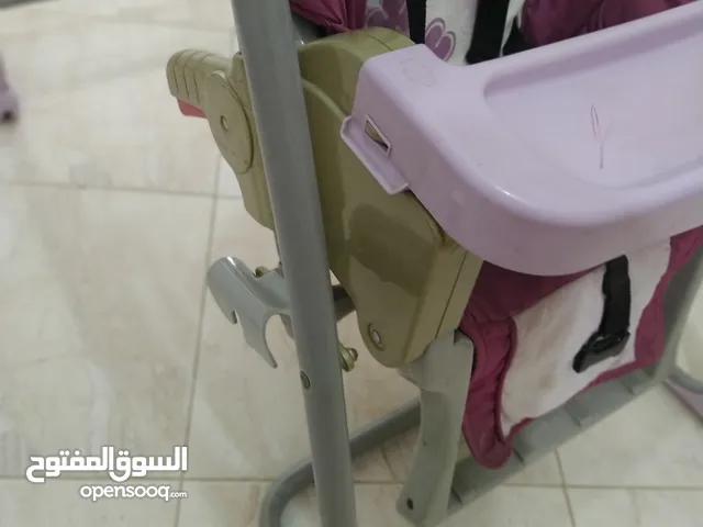 مرجيحة مع كرسي طعام