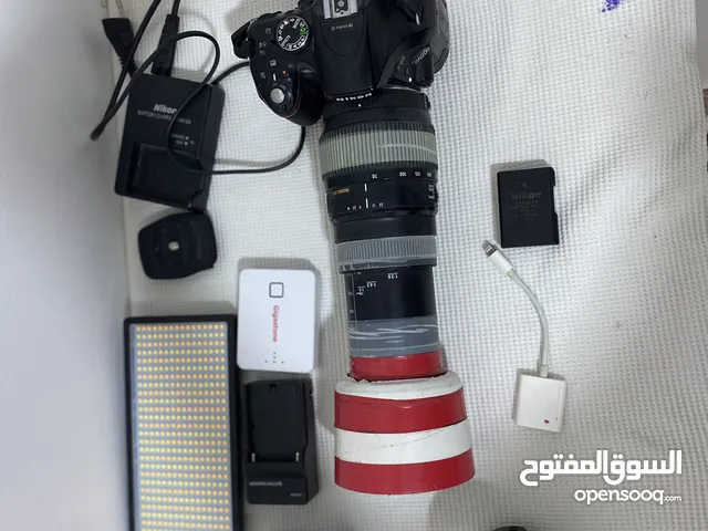 كامره نيكون نضافه 98٪ سعر 500 قابل للتفاوض مع كامل ملحقات وزوم رياضي وعدسه تصوير اصليه