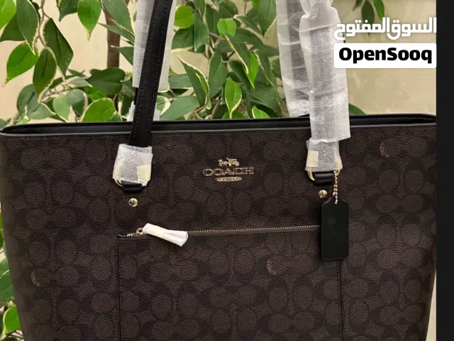 حقيبة بد حجم كبير ماركة كوتش جديدة بورقها وأصلية100%