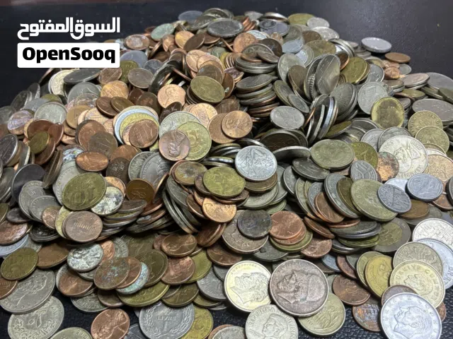 اكثر من 7 كيلو عملات أمريكيه وأوروبيه وعربيه