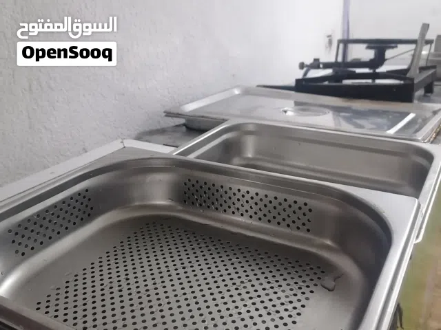 بسعر مغري جدا!!! عرباية ذرة معها جميع أغراضها ،من الملعقة لمناصب الغاز..