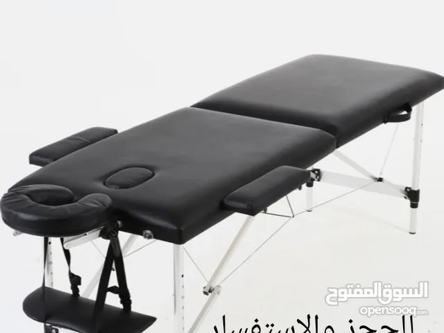 سرير ستانلس وخشب زان للحجامه والمساج والتجميل قابل للطي وقابل للإرتفاع والتحكم 2025