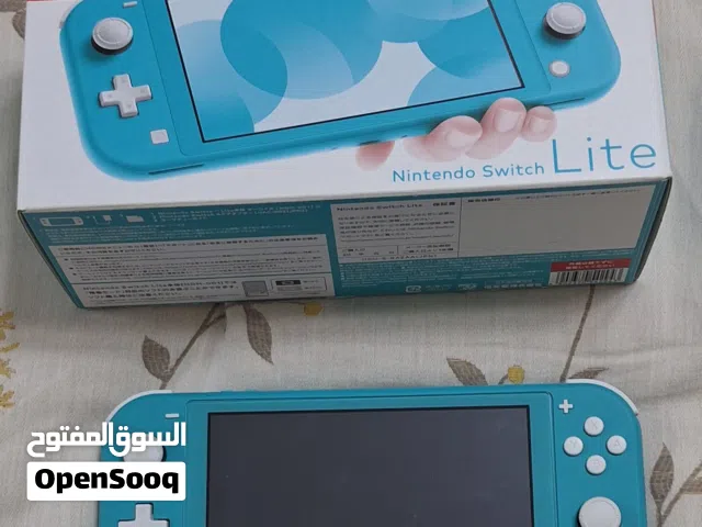 نينتندو سويتش لايت + لعبتين