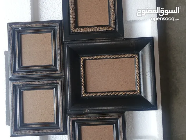 round mirror and 5 in one photos frame
