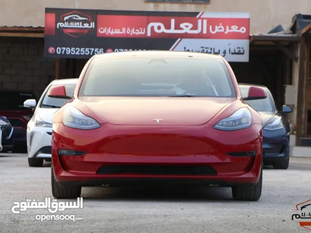 Tesla model 3خمري ميتلك 2023