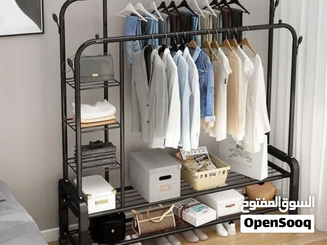 ستاند ملابس معدن ثقيل برفوف وعجلات