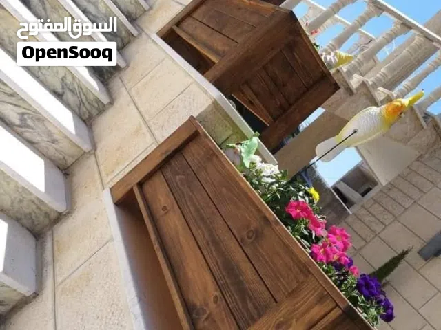 جمل حديقتك أو بلكونتك بأجمل أحواض الخشب الطبيعي