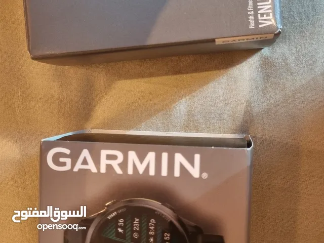 Two brand new Garmin smart watches