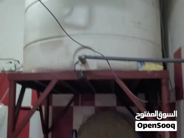 خزان سنتكس مع قاعدة حديد فولاذ