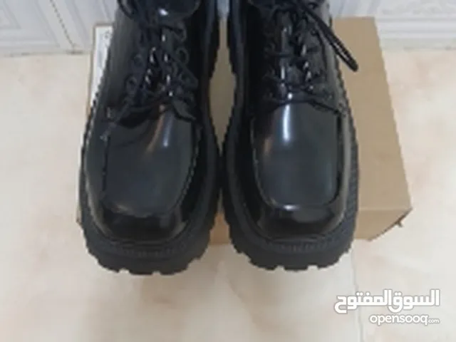 Black Boots in Sharjah