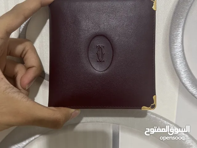 محفظة Cartier must de Cartier