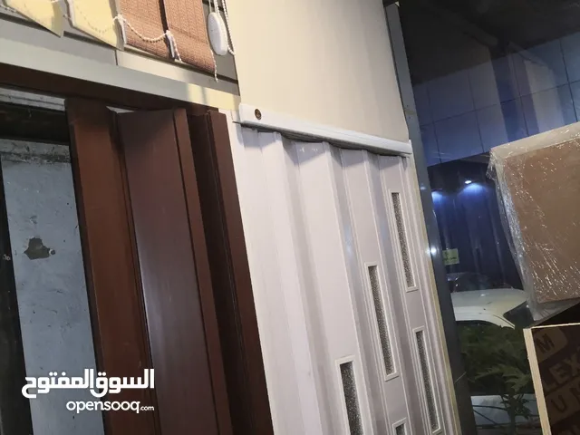 أبواب اكرديون وزجاج واستيل ومظلات زجاج وجميع انواع الحداده