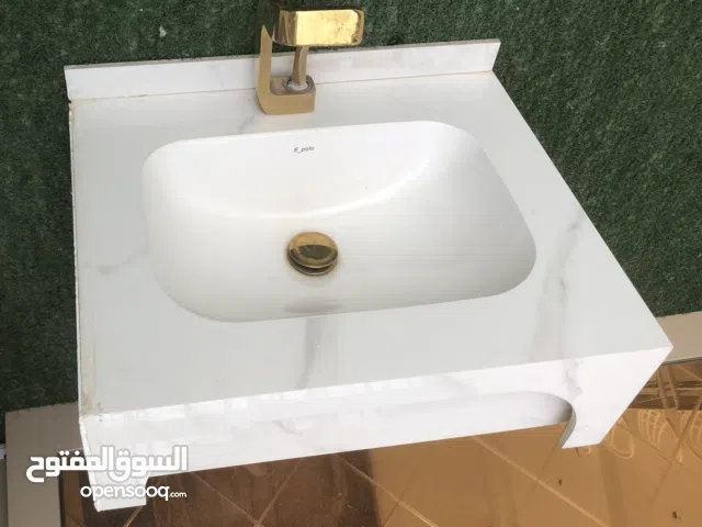 مغسلة تعليك