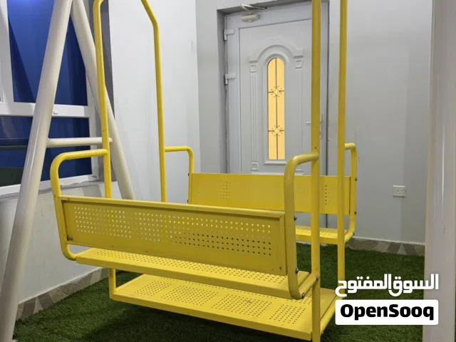 أرجوحة أطفال معدنية_لون أصفر زاهي