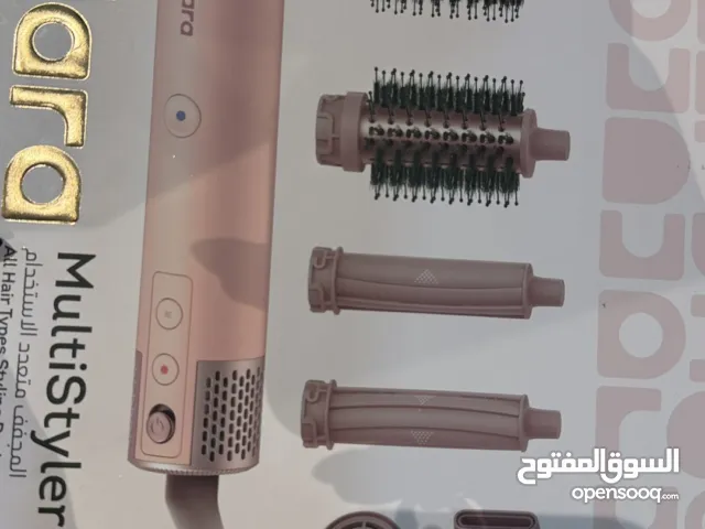 مصفف الشعر من كلارا لون وردي