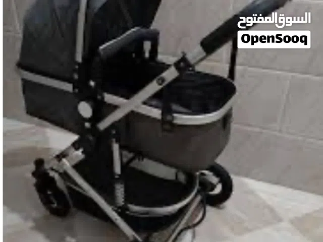 عربانة اطفال وسرير