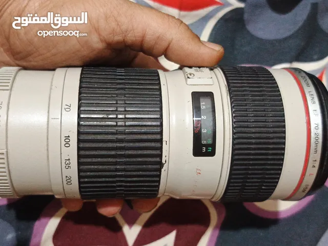 زوم كانون 70_200 فتحه 4