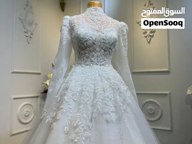 متجر فساتين زفاف وسواريه