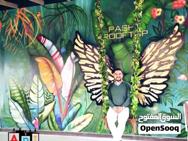 رسام وخطاط ونحات محترف