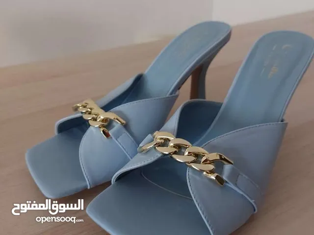 Blue With Heels in Amman