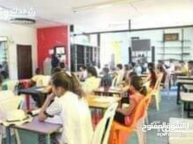 دورات محو الأمية وتعليم الكبار القراءة والكتابة