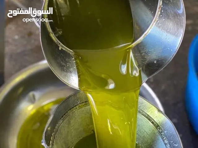 زيت زيتون جديد بكر درجه اولي  اللون اخضر