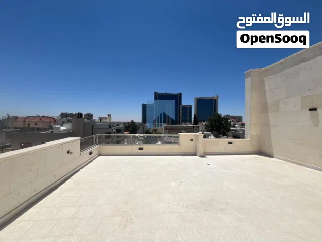 شقة فاخرة للبيع في أم أذينة قرب سوق الذهب طابق ثالث 150م مع روف 110م دوبلكس لم تسكن تشطيب سوبر ديلوك