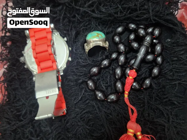مقتنيات ساعه ديزل اصلي مع ضمان مسباح عقيق اصلي خاتم فيروز