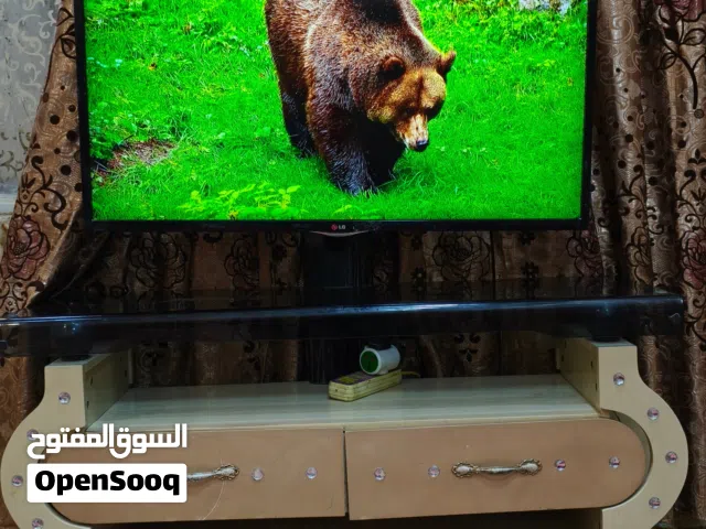 تلفزيون LG حجم 42 وميز وtv box شاومي