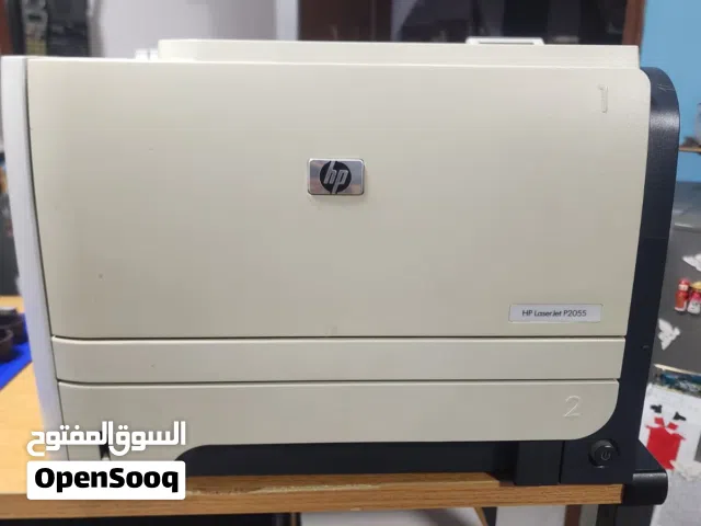 HP LaserJet P2055 Printer +Partially used toner installed in printer + 1 new toner cartridge CE505A