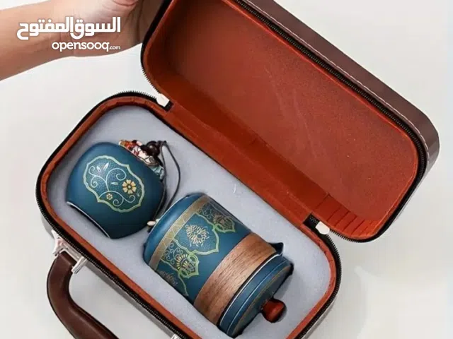 طقم شاي صيني مزخرف  لتهدية و رحلات مع حقيبة جلد فاخر