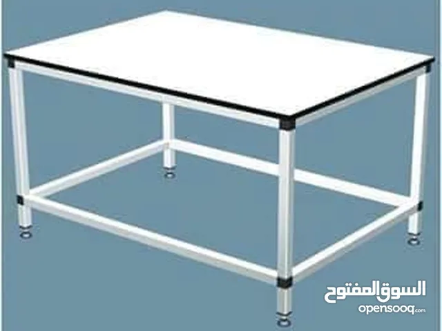 طاولة قص قماش تفصيل