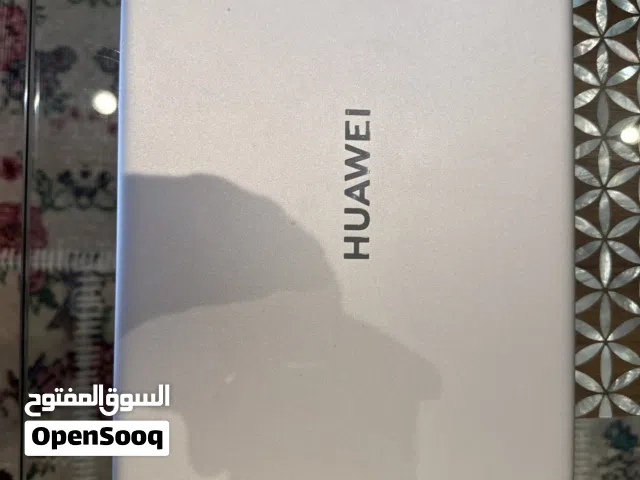 Huawei MateBook with Intel Core i7 and Intel Iris Xe Graphics touch screen with Face ID.