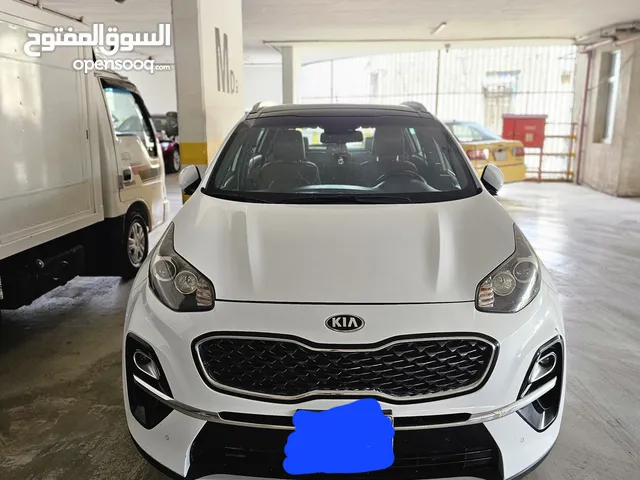 كيا .سبورتج موديل 2019 بغداد. لون ابيض. ماشية 134000 كيلو متر قابل للزيادة تحكم أستيرن جهتين