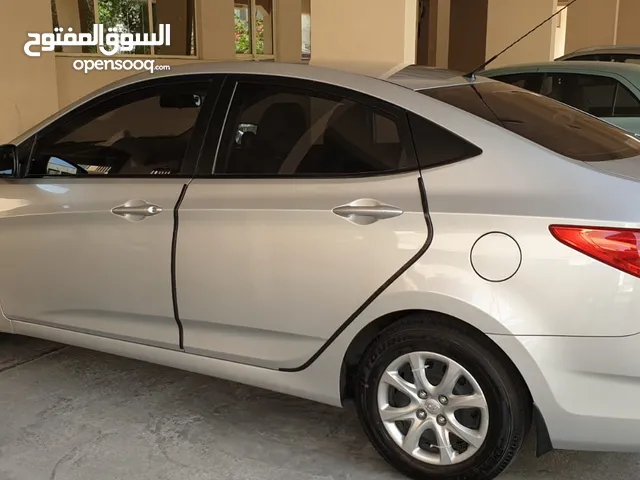 Hyundai Accent 2013 mid-variant- 2 owner , new tyre and battery. Parking sensor.