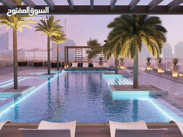 شقة بمساحة واسعة 938 قدم في قلب مجان، وبالقرب من معالم الجذب السياحية في دبي