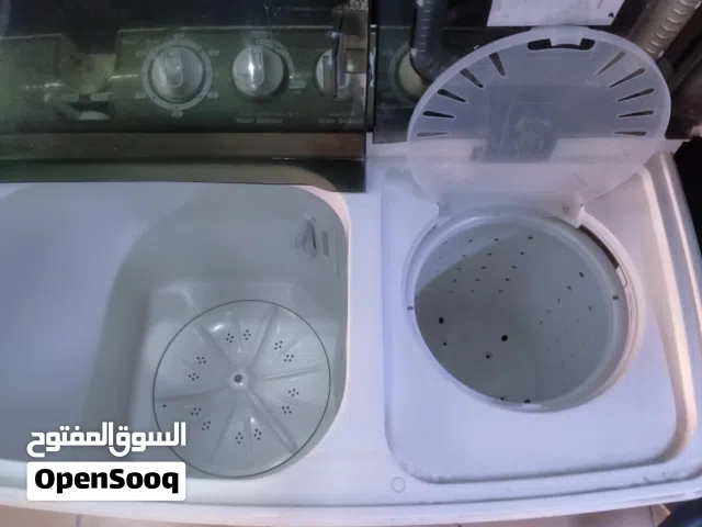Washer and dryer machine cleaning clothes good condition company toshiba VH-7300B model