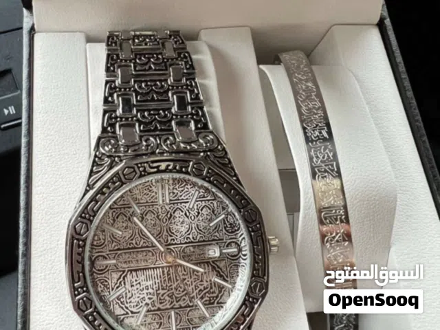 ساعة الكعبه واسوار الحرمين ساعة نادره وضد الصدا والماء من التيتانيوم اصدار خاص