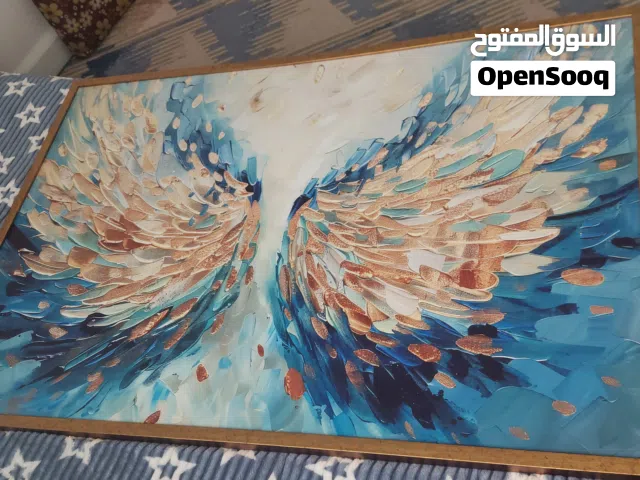 لوحه فنية تجريدية لأجنحة ملاك بألوان زرقاء