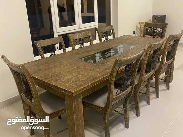 **For Sale: Elegant Wooden Dining Table with 8 Chairs**